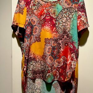 Very comfortable, short sleeve multi-colored, loose top to wear with everything
